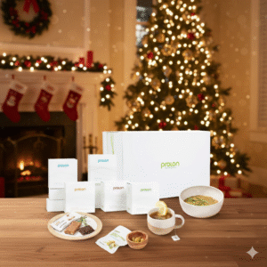 ProLon kit with bowl of soup and water bottle on a table.